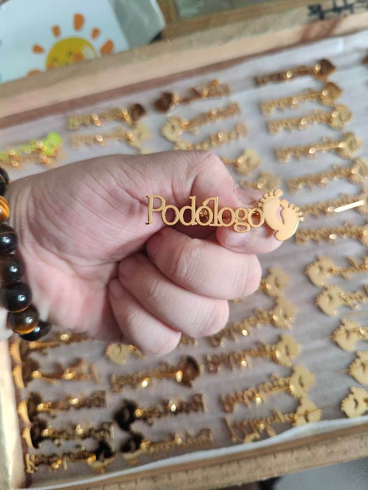 Piocha Podólogo, prendedor